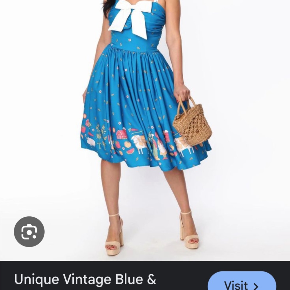 Unique Vintage Blue Midi Fit and Flare Dress with Pleated Tie Front